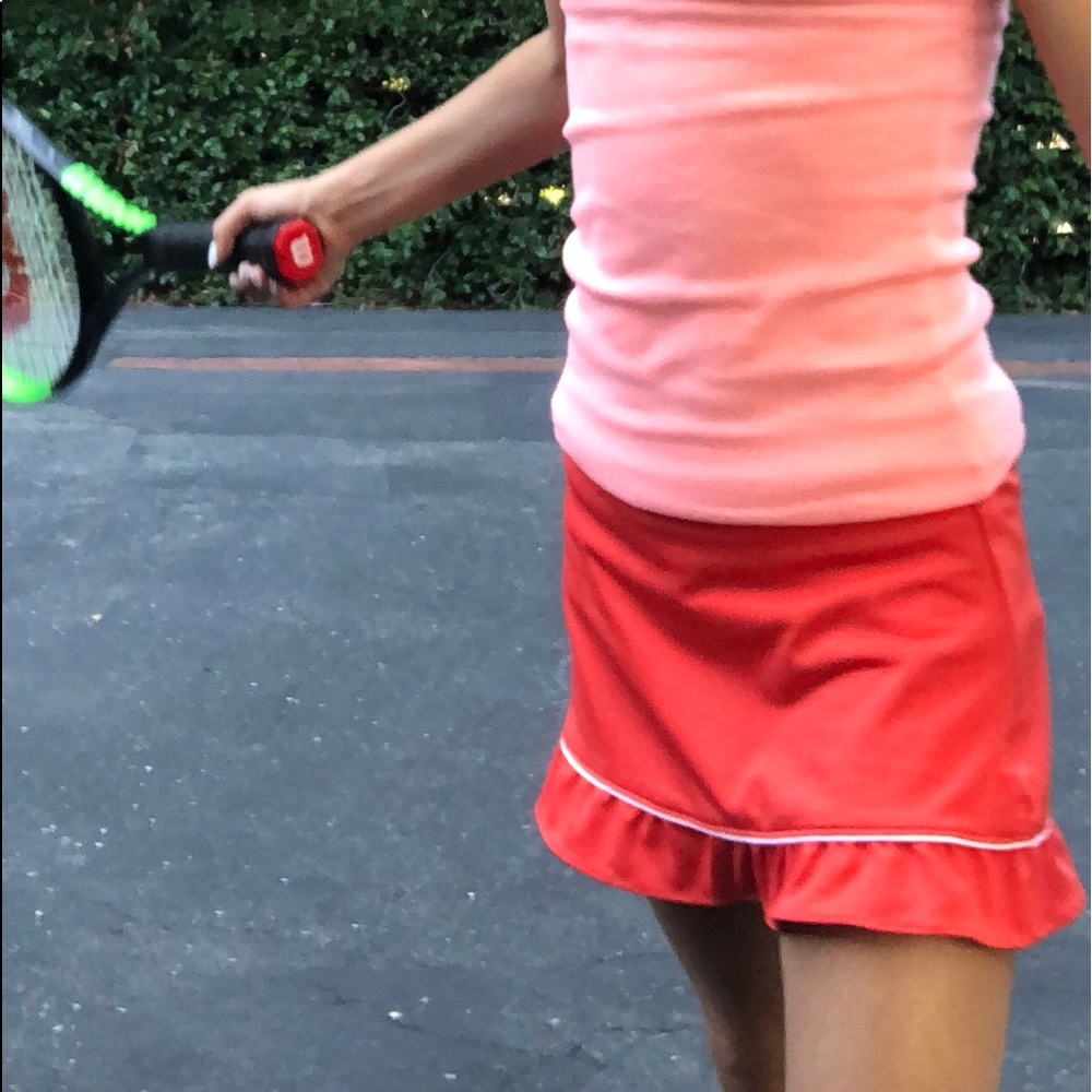 Orange tennis skirt